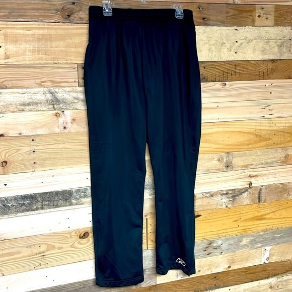 Reebok size medium black track pants with pockets and side ankle zippers - Picture 1 of 7
